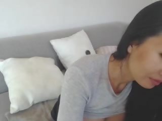 Tempting Asian Leilee Webcam Teasing on the Sofa: Free X rated movie mov 0e